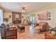 Spacious living room featuring fireplace, ceiling fan and neutral color palette at 1009 Catawba Valley Se Blvd, Hickory, NC 28602
