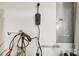 Close-up of a garage wall with EV charger, utility boxes, and hooks at 104 Trellis Ln, Troutman, NC 28166