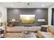 Cozy living room with a modern entertainment center and comfortable sectional sofa at 104 Trellis Ln, Troutman, NC 28166