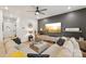 Comfortable living room with modern entertainment center and large sectional sofa at 104 Trellis Ln, Troutman, NC 28166