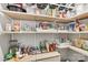 Walk-in pantry featuring ample shelving for organized storage at 104 Trellis Ln, Troutman, NC 28166