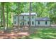 Exterior view of home featuring a lush green lawn and a two car garage at 10501 Stonemede Ln, Matthews, NC 28105