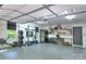 Spacious garage area featuring workout equipment and ample storage at 10501 Stonemede Ln, Matthews, NC 28105