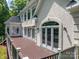Large back of house, showcasing French doors leading to the back deck with black railings at 110 Cramer Mountain Woods None, Cramerton, NC 28032