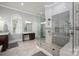 Bathroom featuring a glass enclosed shower, vanity, and decorative tile at 110 Cramer Mountain Woods None, Cramerton, NC 28032