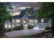 Magnificent home with a circular driveway, manicured landscaping, and a grand entrance with stately columns at 110 Cramer Mountain Woods None, Cramerton, NC 28032