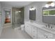 Spacious bathroom featuring dual vanity, modern fixtures, and luxurious glass shower at 141 Edenvale Rd, Rock Hill, SC 29730