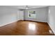 Inviting bedroom with hardwood floors, a ceiling fan and ample natural light from the window at 141 Edenvale Rd, Rock Hill, SC 29730