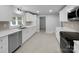 Modern kitchen features stainless steel appliances, white cabinets, and quartz countertops at 141 Edenvale Rd, Rock Hill, SC 29730