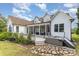 Beautiful backyard with a covered porch and a hot tub, perfect for outdoor relaxation at 14807 Middlesborough Dr, Matthews, NC 28104