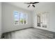 Bright bedroom with multiple windows and stylish French doors at 149 Shady Cove Rd, Troutman, NC 28166