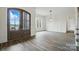 Bright and airy foyer with hardwood floors and craftsman style doors at 149 Shady Cove Rd, Troutman, NC 28166