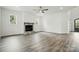 Spacious living area with a fireplace, recessed lighting, and ample natural light at 149 Shady Cove Rd, Troutman, NC 28166