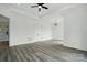 Spacious main bedroom suite with tray ceilings, statement light fixtures, and large windows for plenty of light at 149 Shady Cove Rd, Troutman, NC 28166