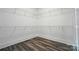 An open walk-in closet with adjustable shelving and laminate flooring at 149 Shady Cove Rd, Troutman, NC 28166