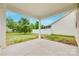 View of a concrete covered patio leading to a well maintained, fenced backyard at 1507 Arcadia Bluff Dr, York, SC 29745