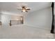 Upstairs loft area with carpet floors and a ceiling fan at 1507 Arcadia Bluff Dr, York, SC 29745