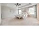 Spacious main bedroom boasting a tray ceiling, neutral tones, and plush carpeting at 1507 Arcadia Bluff Dr, York, SC 29745
