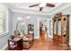 Cozy bedroom with hardwood floors, neutral paint, and lots of natural light at 162 Kenway Loop, Mooresville, NC 28117