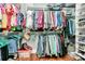 Walk-in closet with extensive built-in shelving and racks to maximize storage space at 162 Kenway Loop, Mooresville, NC 28117