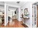 Inviting foyer featuring hardwood flooring, and elegant decor at 162 Kenway Loop, Mooresville, NC 28117