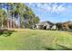 Spacious backyard with mature trees providing privacy at 162 Kenway Loop, Mooresville, NC 28117