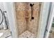Corner shower featuring tile walls and a matte black shower head at 162 Kenway Loop, Mooresville, NC 28117