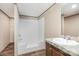 Bathroom with granite countertop and shower at 1785 Doe Ct, Iron Station, NC 28080