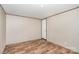 Empty bedroom with hardwood floors, neutral walls and ceiling light at 1785 Doe Ct, Iron Station, NC 28080