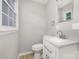 Bathroom featuring modern vanity with white cabinets and granite counter at 1874 Sunny Ln, Lancaster, SC 29720