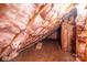 View of the unfinished attic space featuring pink insulation and a wooden floor at 2240 Armstrong Park Dr, Gastonia, NC 28054