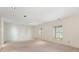 Large finished basement area with recessed lights and natural light from shuttered windows at 232 Perrin Pl, Charlotte, NC 28207