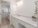 Bathroom with a white vanity, quartz countertop, and access to another bathroom space at 232 Perrin Pl, Charlotte, NC 28207