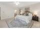 Bright main bedroom offering neutral walls, a large bed, shuttered windows, and modern décor at 232 Perrin Pl, Charlotte, NC 28207