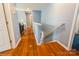 Hallway with wood floors and blue walls at 2772 Sherrills Stream Dr, Sherrills Ford, NC 28673
