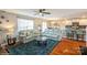 Spacious living room open to the kitchen, featuring comfortable seating, and ample natural light at 2772 Sherrills Stream Dr, Sherrills Ford, NC 28673