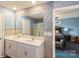 Bright main bathroom with double sinks and a tiled backsplash at 2772 Sherrills Stream Dr, Sherrills Ford, NC 28673