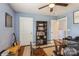 Comfortable office space with glass desk, wooden floors, and an abundance of natural light at 2772 Sherrills Stream Dr, Sherrills Ford, NC 28673