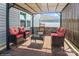 Inviting patio area featuring cozy wicker seating and a peaceful ambiance for outdoor gatherings at 2772 Sherrills Stream Dr, Sherrills Ford, NC 28673