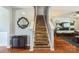 Stairway with wooden floors leads to the upper level at 2772 Sherrills Stream Dr, Sherrills Ford, NC 28673