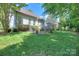 A large yard with a deck is perfect for grilling or enjoying the scenery at 3009 Thayer Dr, Waxhaw, NC 28173