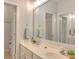 Bright bathroom features double sinks, large mirror, and a separate toilet area at 3009 Thayer Dr, Waxhaw, NC 28173