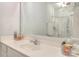 Bright bathroom vanity and mirror with a shower/tub combination at 3009 Thayer Dr, Waxhaw, NC 28173