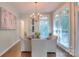 Cozy dining area with ample natural light and an elegant chandelier at 3009 Thayer Dr, Waxhaw, NC 28173