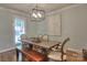 Charming dining room with a rustic wooden table, perfect for Gathering meals at 3009 Thayer Dr, Waxhaw, NC 28173