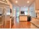 Spacious kitchen with modern appliances opens to a living area with elegant columns at 3009 Thayer Dr, Waxhaw, NC 28173