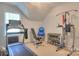 Home workout room features a treadmill, weights, and an exercise machine at 3009 Thayer Dr, Waxhaw, NC 28173