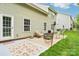 There's a patio with an outdoor seating area and door leading inside at 3032 Kilbeggan Dr, Lake Wylie, SC 29710