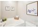 Bathroom showcasing a large tub, vanity, and tasteful decor for a spa-like experience at 3032 Kilbeggan Dr, Lake Wylie, SC 29710
