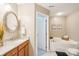 Bathroom with double sink vanity, granite countertops, and a large tub with a view at 3032 Kilbeggan Dr, Lake Wylie, SC 29710